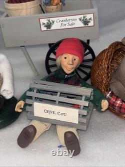 BYERS CHOICE CAROLER CRANBERRY HARVEST CAPE COD SIGN 2 Children 2 Dogs CHRISTMAS