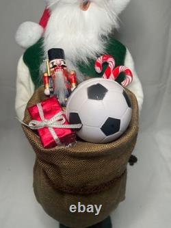 Byers Choice 2022 Santa with Sack of Toys, Peppermint Candy Canes & Soccer Ball
