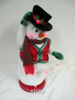 Gemmy Spinning Snowflake Snowman Snow Miser Red Vest