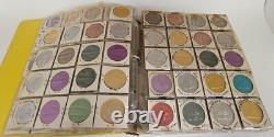 MARDI RAS DOUBLOON ALBUM CONTAINING APPROXIMATELY 273 1960-70's'S VINTAGE COINS
