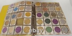 MARDI RAS DOUBLOON ALBUM CONTAINING APPROXIMATELY 273 1960-70's'S VINTAGE COINS