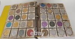 MARDI RAS DOUBLOON ALBUM CONTAINING APPROXIMATELY 273 1960-70's'S VINTAGE COINS