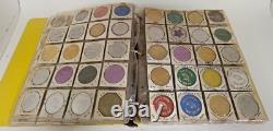 MARDI RAS DOUBLOON ALBUM CONTAINING APPROXIMATELY 273 1960-70's'S VINTAGE COINS
