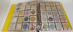 MARDI RAS DOUBLOON ALBUM CONTAINING APPROXIMATELY 273 1960-70's'S VINTAGE COINS