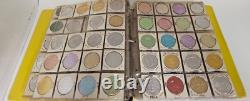 MARDI RAS DOUBLOON ALBUM CONTAINING APPROXIMATELY 273 1960-70's'S VINTAGE COINS