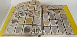 MARDI RAS DOUBLOON ALBUM CONTAINING APPROXIMATELY 273 1960-70's'S VINTAGE COINS
