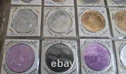 MARDI RAS DOUBLOON ALBUM CONTAINING APPROXIMATELY 273 1960-70's'S VINTAGE COINS