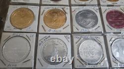 MARDI RAS DOUBLOON ALBUM CONTAINING APPROXIMATELY 273 1960-70's'S VINTAGE COINS