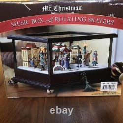 Mr Christmas Animated Illuminated Music Box with Rotating Skaters