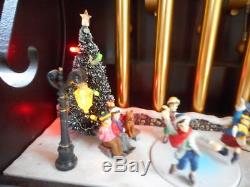 Mr. Christmas Animated Musical Chimes SKATERS withCLOCK 70 Songs Box Scenery