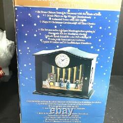 Mr. Christmas Clock with animated chimes and Ballroom dancers plays 70 songs
