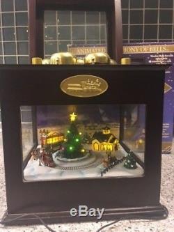 Mr. Christmas Gold Label Animated Music Box Symphony of Bells plays 50 songs