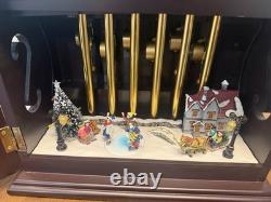Mr. Christmas Gold Label Animated Musical Chimes Skaters