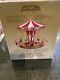 Mr. Christmas Gold Label Collection World's Fair Swing Carousel Read