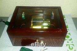 Mr. Christmas Gold Label Harmonique Music Box with animated dancers play 100 songs