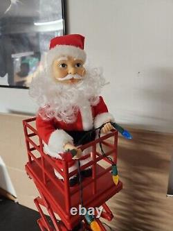 Mr Christmas Musical Animated Musical Santas Scissor Lift (Read)