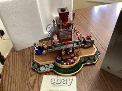 Mr. Christmas. Santa's toy factory. Works great. SEE VIDEO