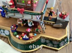 Mr. Christmas. Santa's toy factory. Works great. SEE VIDEO