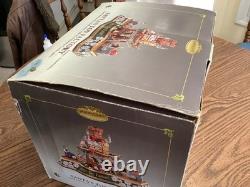 Mr. Christmas. Santa's toy factory. Works great. SEE VIDEO