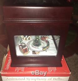 Mr Christmas music box Animated Symphony Of Bells withMoving Train Plays 50 Songs