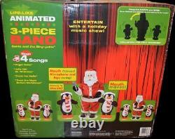 Nib 2006 Gemmy Animated Life Like 3 Piece Singing Dancing Band Santa & Penguins