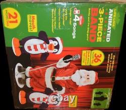 Nib 2006 Gemmy Animated Life Like 3 Piece Singing Dancing Band Santa & Penguins