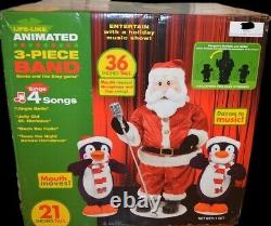 Nib 2006 Gemmy Animated Life Like 3 Piece Singing Dancing Band Santa & Penguins