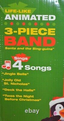 Nib 2006 Gemmy Animated Life Like 3 Piece Singing Dancing Band Santa & Penguins