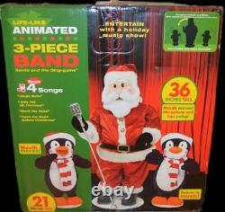 Nib 2006 Gemmy Animated Life Like 3 Piece Singing Dancing Band Santa & Penguins