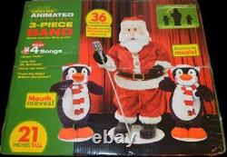 Nib 2006 Gemmy Animated Life Like 3 Piece Singing Dancing Band Santa & Penguins