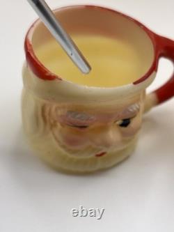 Set of 12 miniature made in Hong Kong Winking Santa plastic mugs Set of 12 miniature made in Hong Kong Winking Santa plastic mugs