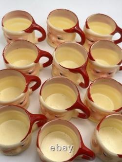 Set of 12 miniature made in Hong Kong Winking Santa plastic mugs Set of 12 miniature made in Hong Kong Winking Santa plastic mugs