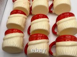 Set of 12 miniature made in Hong Kong Winking Santa plastic mugs Set of 12 miniature made in Hong Kong Winking Santa plastic mugs
