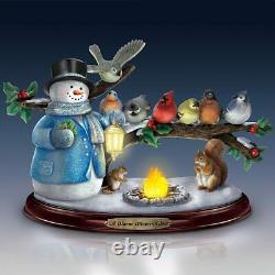 The Thomas Kinkade Musical Winter Glow Snowman Painter of Light Christmas Decor