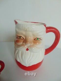 Vintage gemstone santa pitcher & 6 winking santa mugs